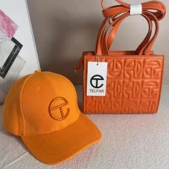 CHINA 2058 - ORANGE T PURSE