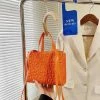 CHINA 2058 - ORANGE T PURSE