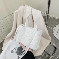 CHINA WHAT'S NEW 2058 - WHITE T PURSE