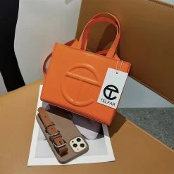 CHINA 2063 - ORANGE PURSE WHAT'S NEW